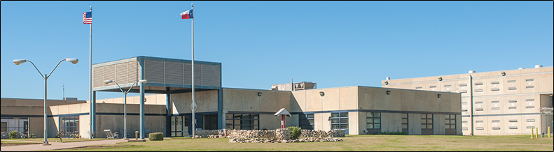 prison unit building with the words 'Find a Facility' written across it