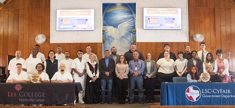 21 participants, sponsors, and TDCJ personnel at debate