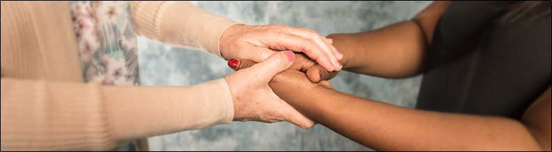two people holding hands with the words 'Information for Victims' written across it